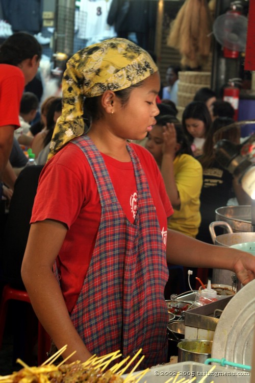 18 girl grilling satay.jpg