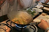 33 mixing up the phad thai.jpg